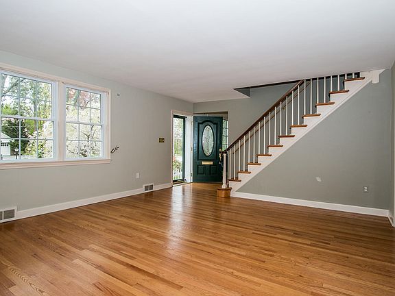 Beautiful hardwood floors flow from LR to DR
