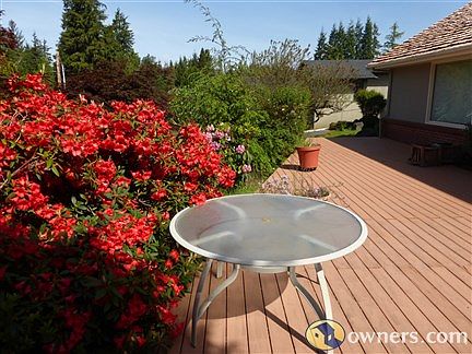 Front deck with beautiful rhoadies.