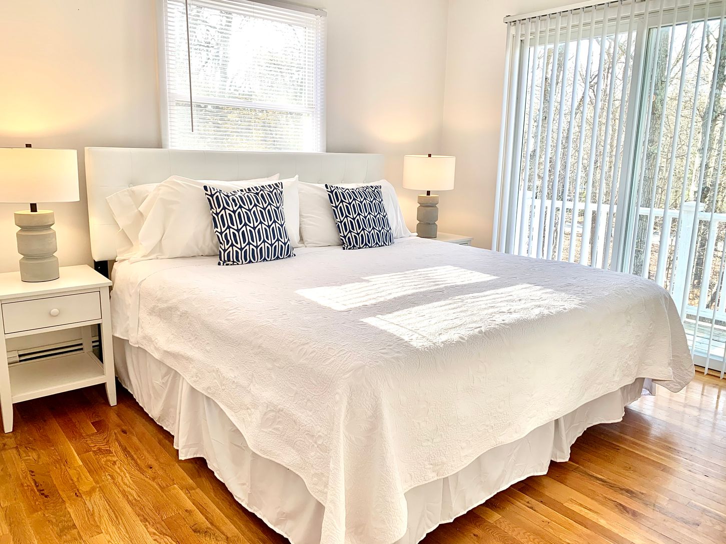  Sunlit master with king bed, sliding doors & private balcony, flat screen tv, & adjoining bathroom