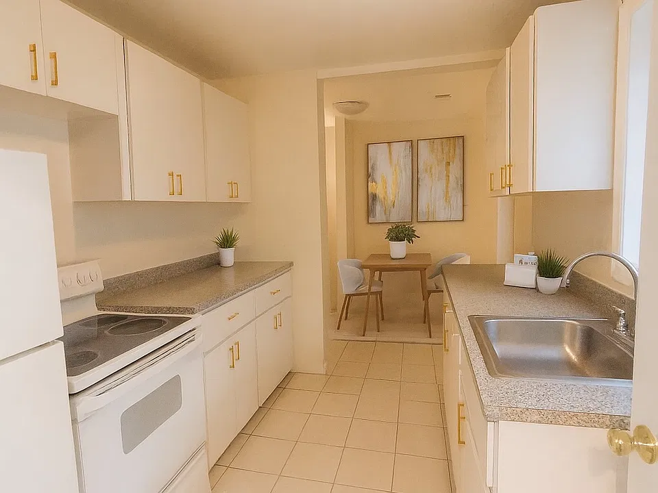 Enter through the kitchen which leads to dining nook