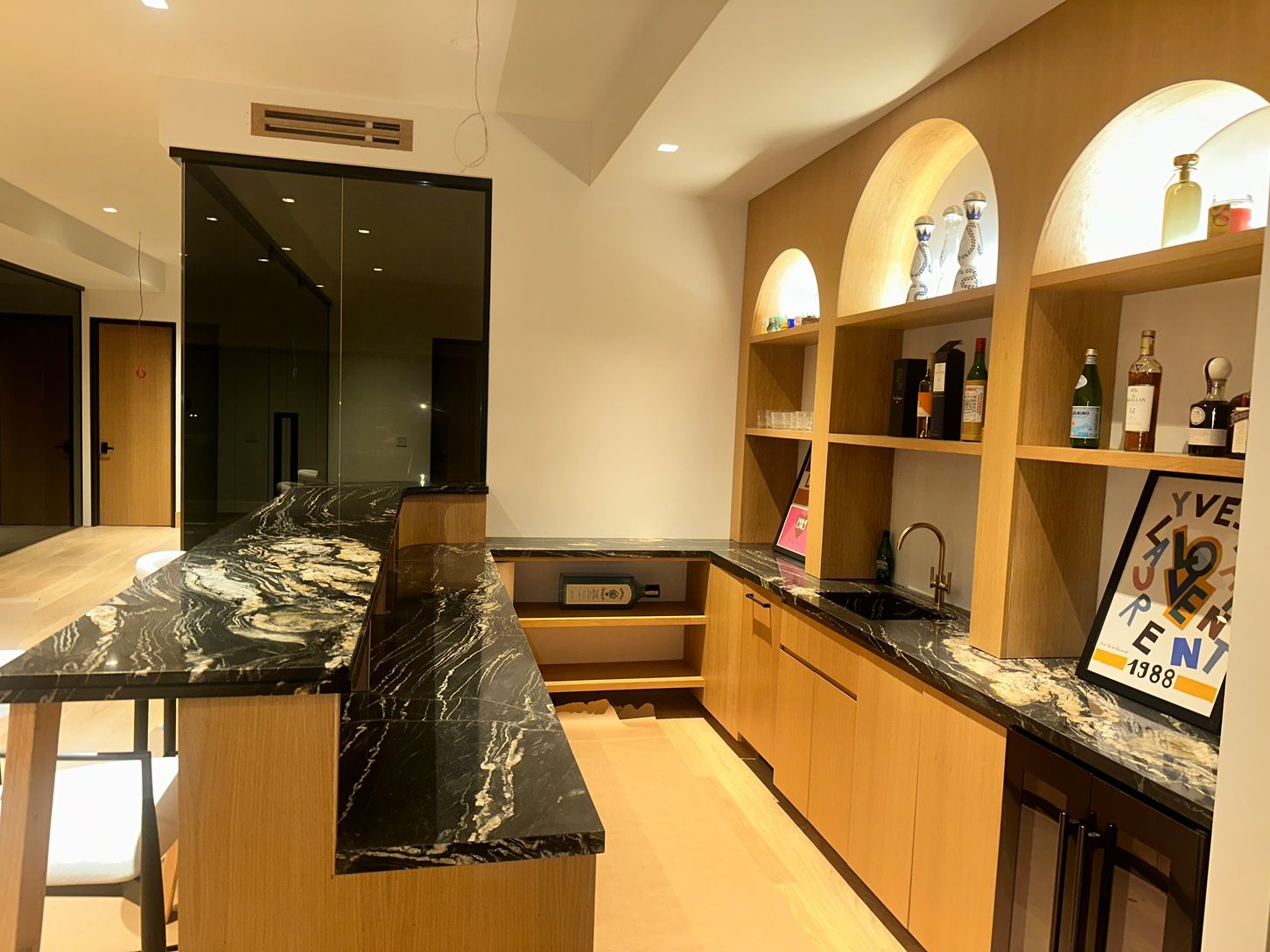  Full bar with wine cooler & fridge, another dishwasher and marble integrated sink