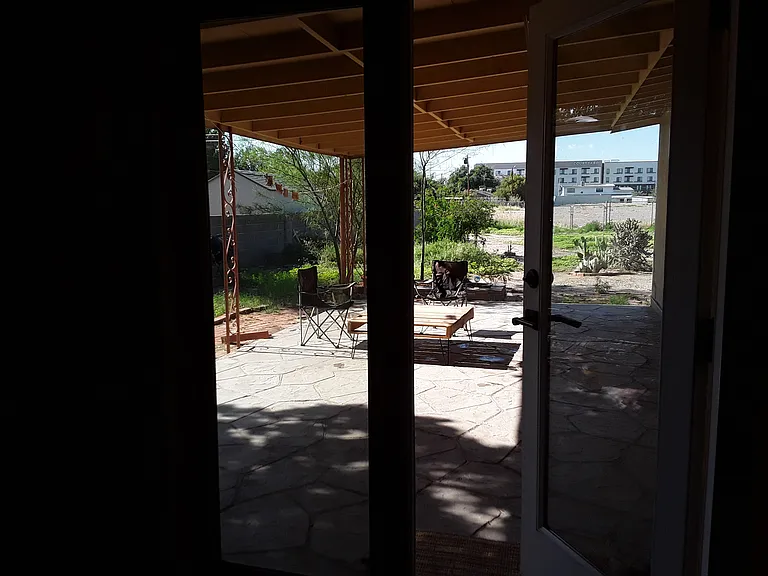 Covered patio from kitchen French doors
