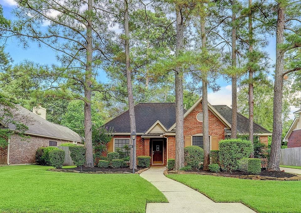 This single story home on a beautiful wooded lot has great curb appeal.