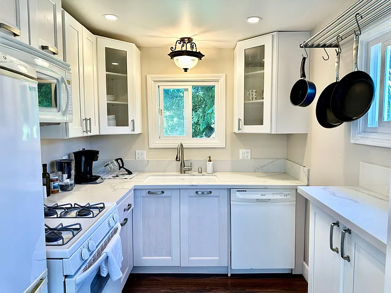 Kitchen. Note that we purchase a new Bosch stainless steel fridge since this photo was taken.
