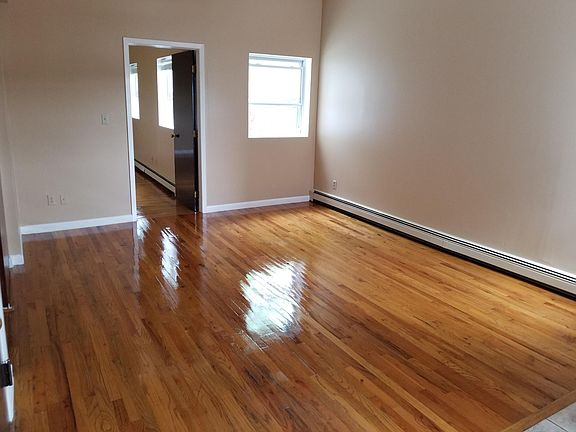 living room with double closet and pantry closet or storage closet