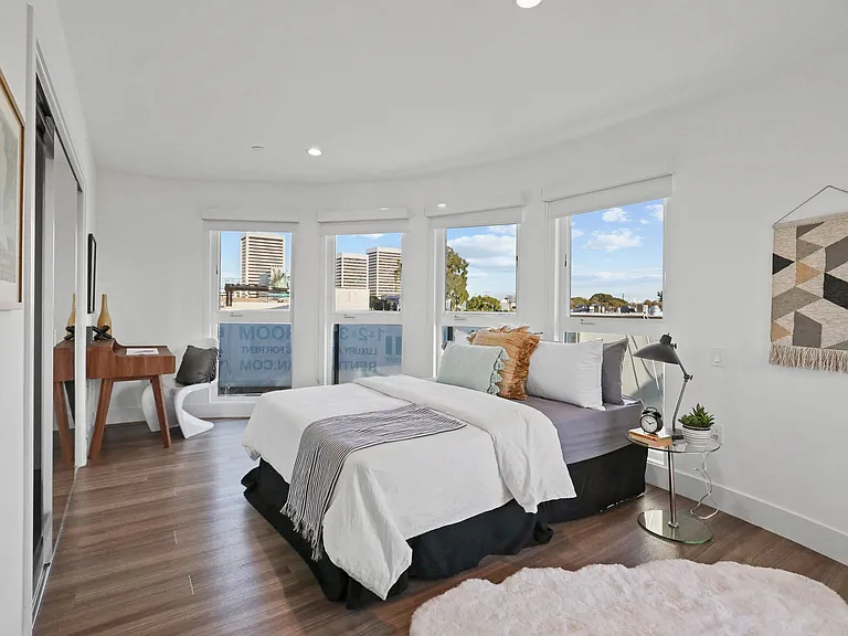 Spacious Bedroom with Closet and Vinyl Flooring