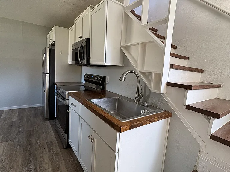 Large, open kitchen with new appliances