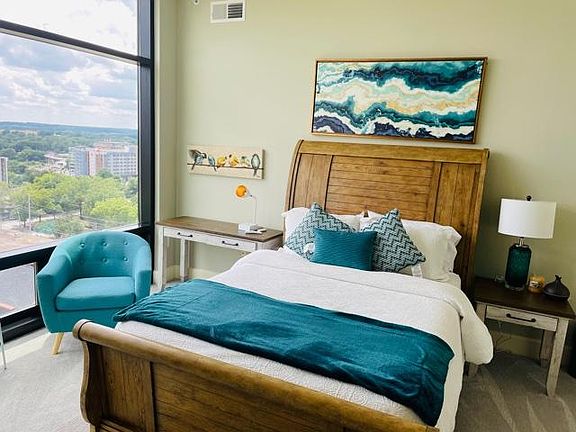 Bedroom two with full bathroom and access to the balcony
