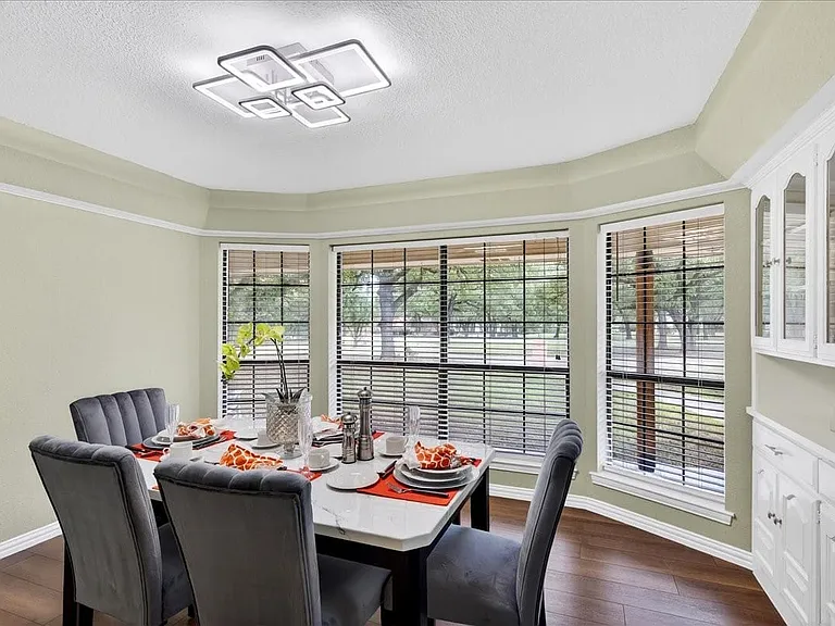 Dining room can seat everyone at the holidays, plus the built in china cabinet and storage.