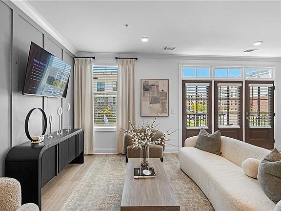 Welcome home to Market Square at Sawnee Village! Images shown are from a decorated model of the sam