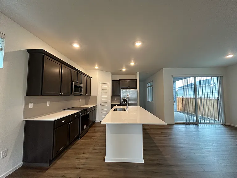 Kitchen and sliding door to the patio.