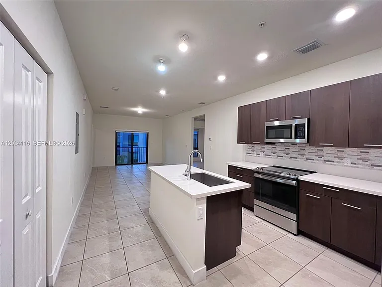 8265 NW 41st St #C-405 — Photo 1