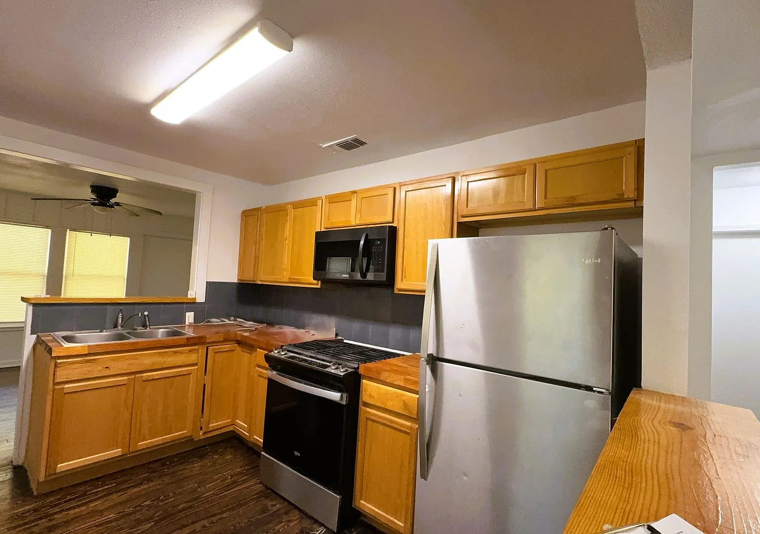 Charming 3-Bedroom Home with Hardwood Floors & Private Fenced Yard — Photo 3