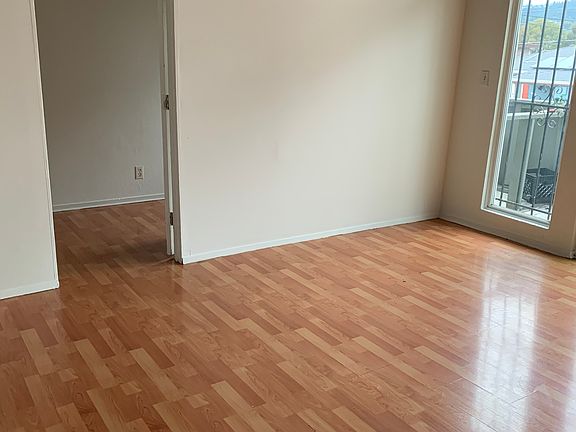 Partial view of living area and office.
