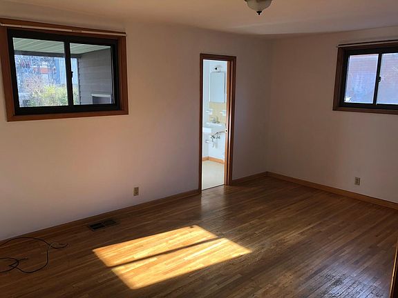 Large master bedroom with attached half bath