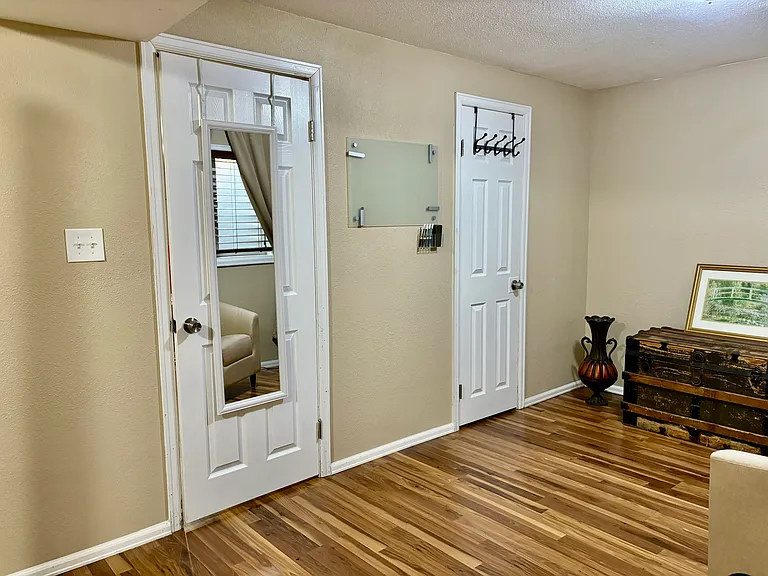 Large Bedroom: full-length mirror, walk-in closet