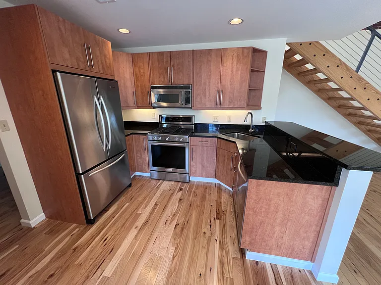 Kitchen with high-end appliances and tons of storage.
