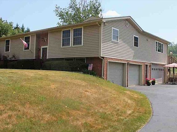 4 stall garage large driveway
