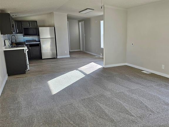 2nd image of 14470 E 13th Avenue LOT E43