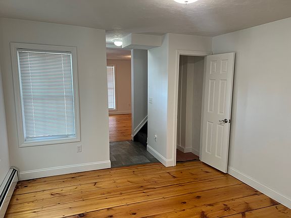 One of two living spaces on first floor both with closets