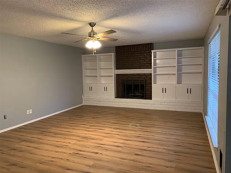 10015 NW Woodland Village Dr — Photo 3