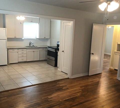 Enjoy intimate space but easy living style . . . 2 bedroom and 1 bath off living area. Aren't these floor gorgeous?