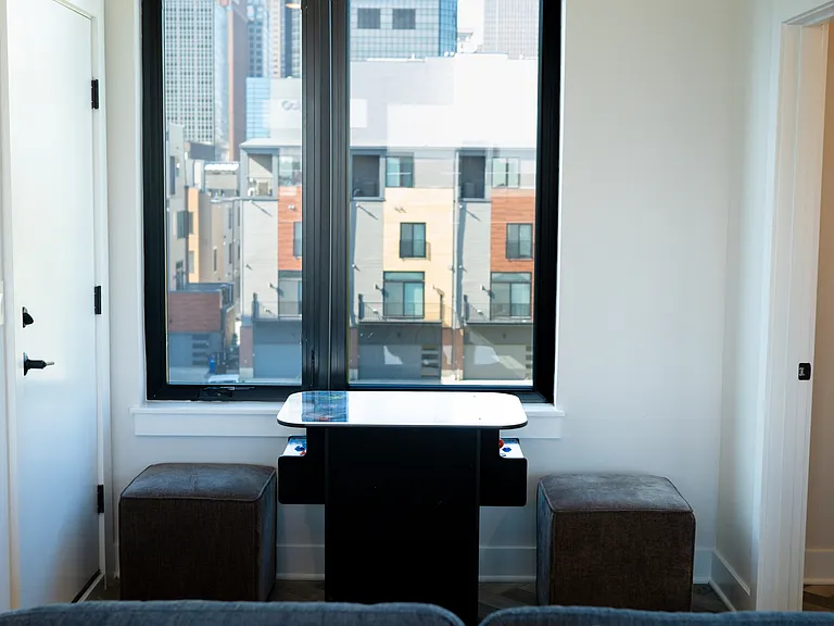 Seated arcade with skyline city views