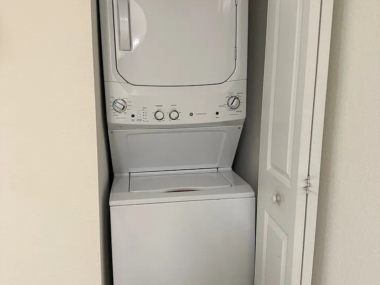 Laundry made easy with your own in-unit stackable washer and dryer.
