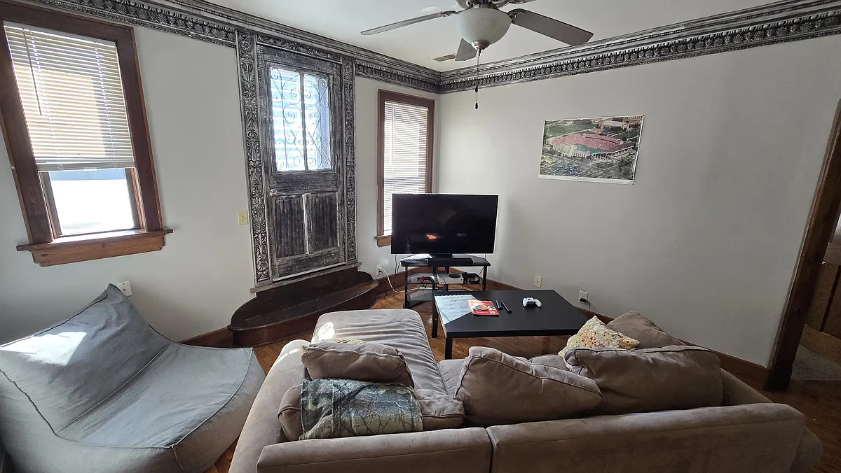 Living Room - Large private deck through antique door! - 906 S 5th St #202