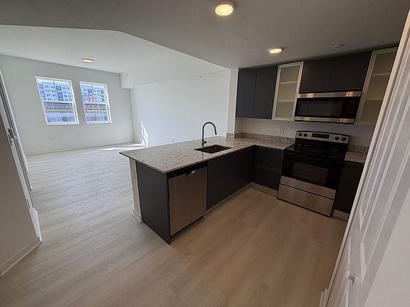 4th image of 5587 Millenia Park Blvd #103