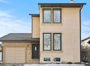 161 NE Macewan Glen Dr NW, Calgary, AB T3K 2C4