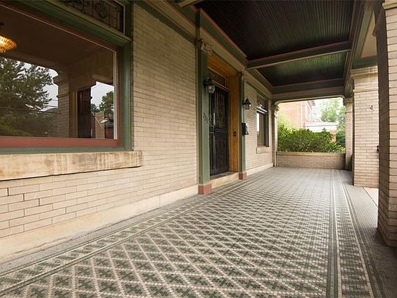 Large front porch (38x11) running the full span of the home perfect to enjoy quiet evenings on overlooking the front yard.
