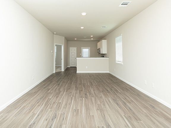Family Room to Dining Area and Kitchen