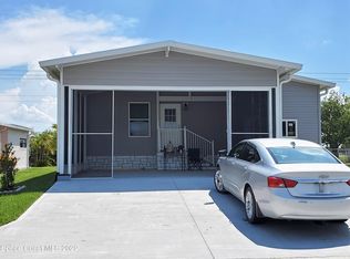 1003 Wren Cir, Barefoot Bay, FL 32976