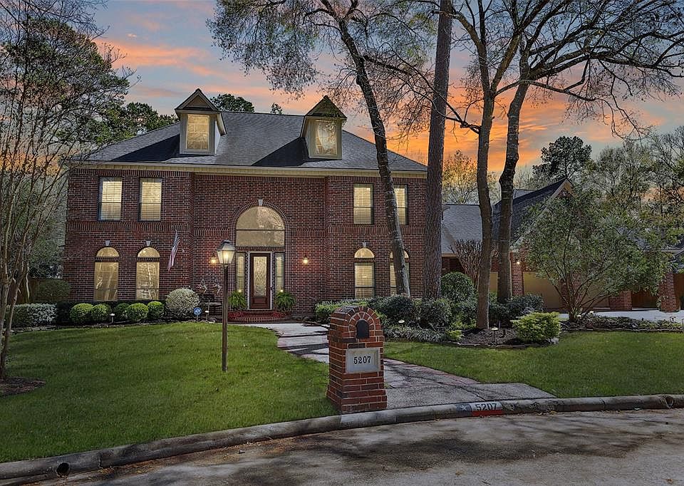 5207 Royal Walk is a remarkable red brick home that sits on a quiet cut-de-sac street. The home features a 3-car garage and carport.