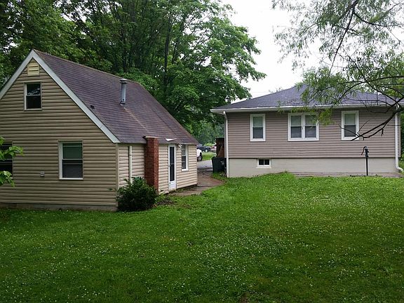 House view from rear yard. Small home (858 B) to left is wha