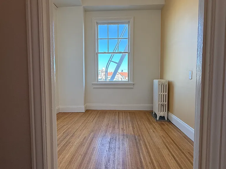 Entering breakfast nook area from hallway. Another nice window that opens top and bottom.