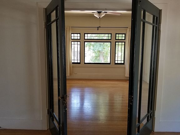 French Doors Divide Living & Dining Rooms