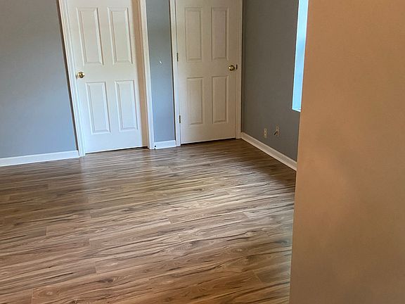 Bedroom #1 (Primary Bedroom with two walk -in closets and full bath)