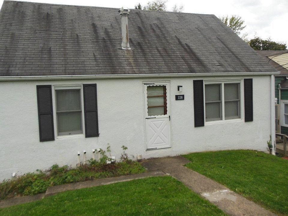 Front of house: free off-street is on left side of house