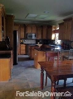large driveway, 3 car garage