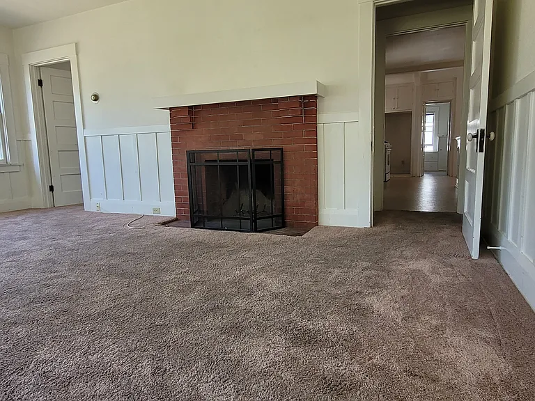 LIVING ROOM SHOWING FIREPLACE