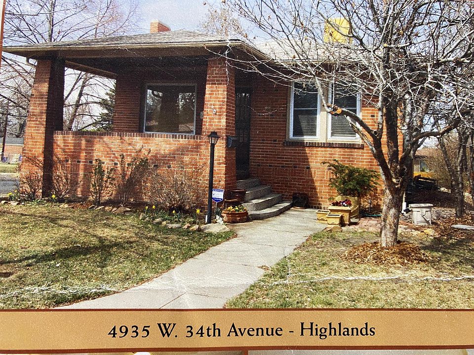 Classic 1923 bungalow on corner lot with south-facing front porch. Rich pink Brandenburg blooming crabapple tree in spring.