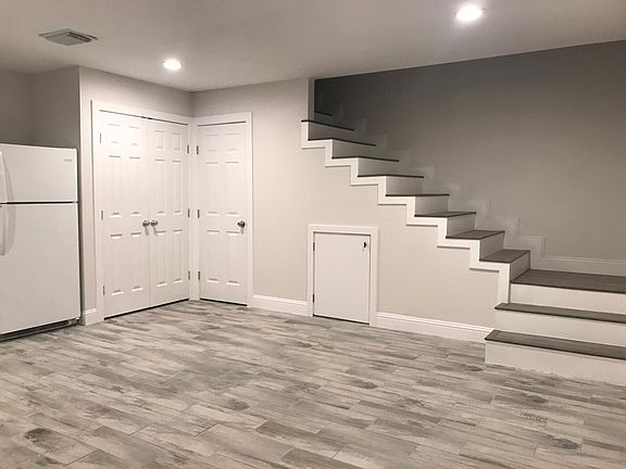 Stairs to upstairs loft bedroom and full bath.