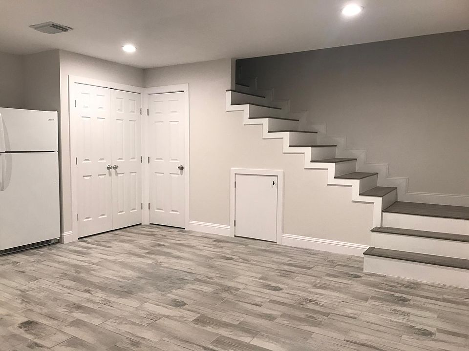Stairs to upstairs loft bedroom and full bath.