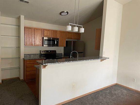 View of Kitchen With Breakfast Bar
