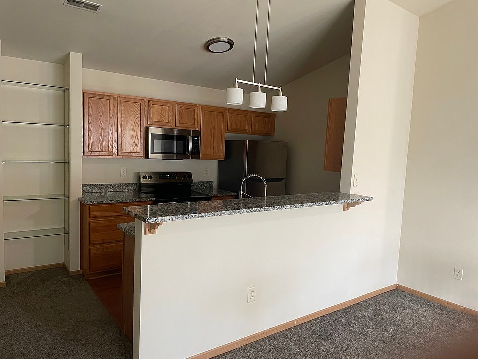 View of Kitchen With Breakfast Bar