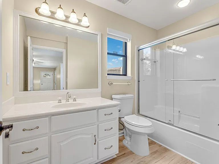 Additional bathroom located off of den/game room.