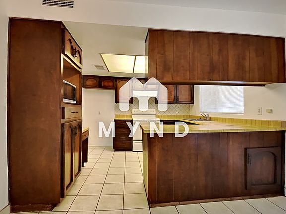 5th image of 3312 W Montebello Ave
