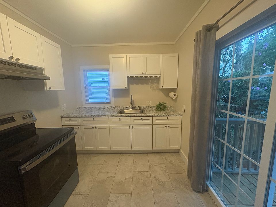 Brand new kitchen with slider to private deck